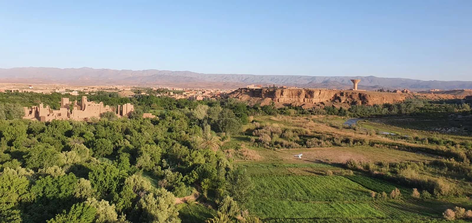 Green fields and earthen settlements in the Dades Valley