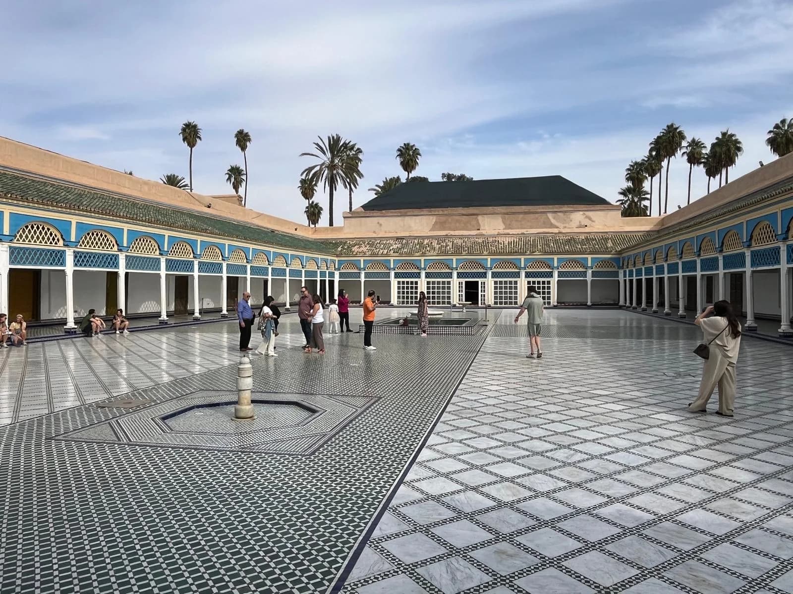 Tiled courtyard and painted arcades at Bahia Palace in Marrakech